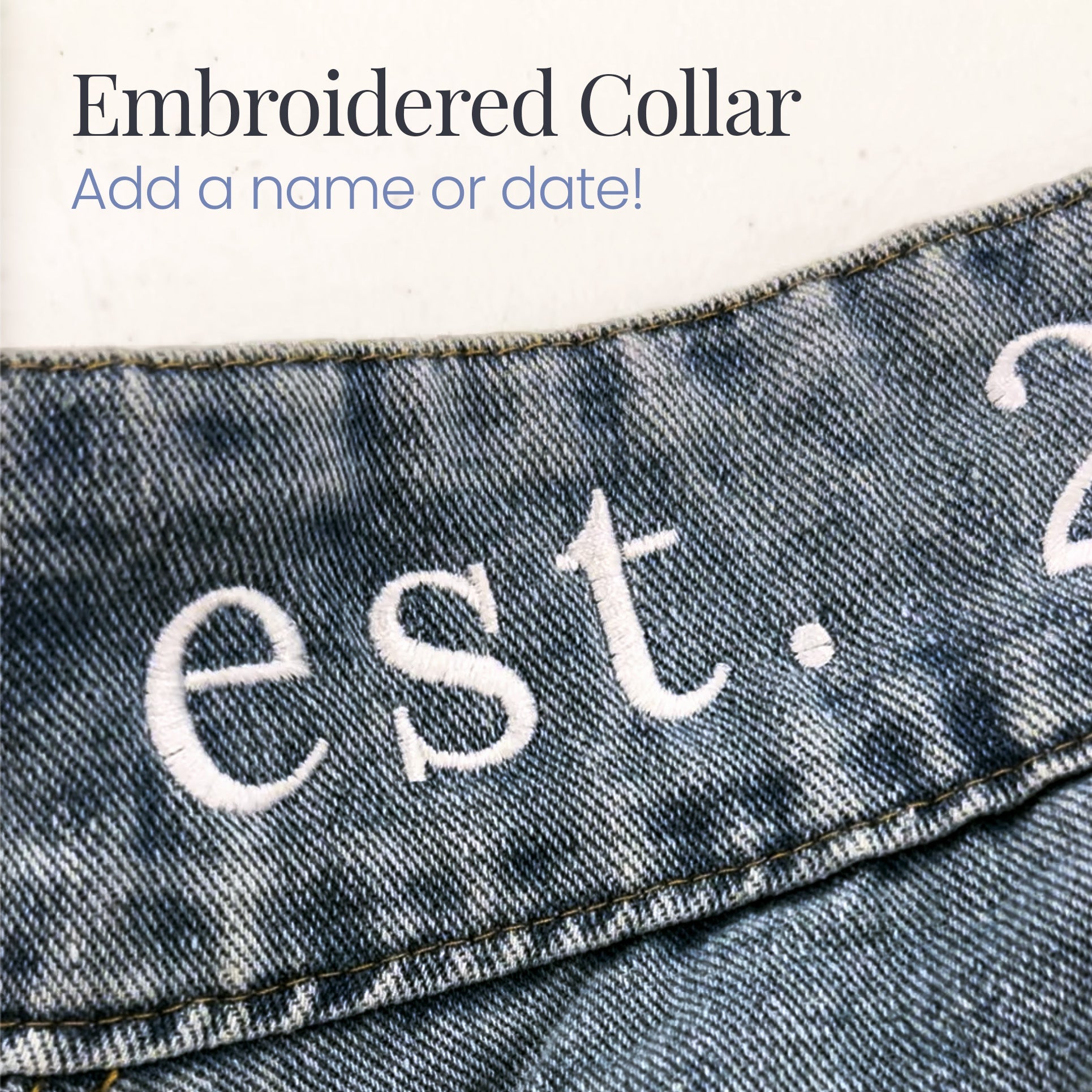 a pair of jeans with the words est 2 embroidered on them