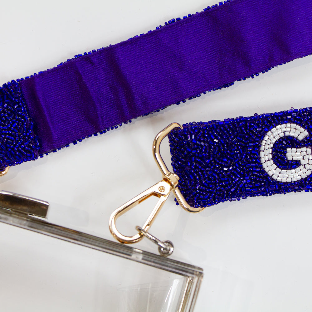 Handcrafted 46in crossbody beaded strap in versatile neutral or vibrant colors, designed to complement any bag or purse. This customizable strap can be tailored for game days or as a unique Bridal Clutch accessory, making it a thoughtful gift for brides or loved ones. With its clips for easy attachment, it also serves as a potential guitar or camera strap, exemplifying the uniqueness and charm of handmade items.