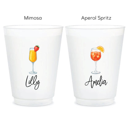 a couple of cups that have drinks in them