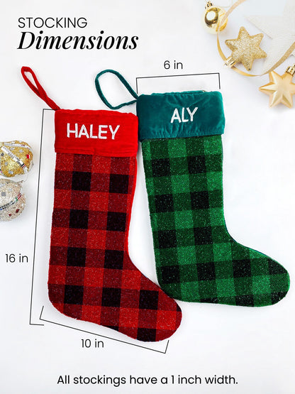 two personalized Christmas stockings, one red and one green, with the names "Haley" and "Aly" respectively, placed on a white background. The stockings are labeled with their respective names and dimensions, indicating that they are 6 inches wide and 10 inches long.