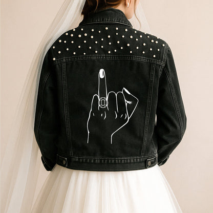 a woman wearing a black jean jacket with a finger on it