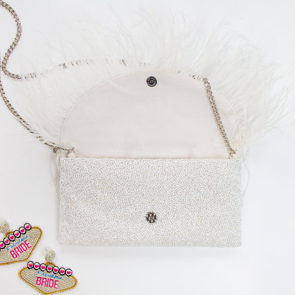 Elegant Custom Seed Bead Clutch Purse with Feather Style design, measuring 9" W x 5" H. Perfect for weddings, it offers a handcrafted intricate pattern and comes with an optional gold or silver chain. This unique, one-of-a-kind purse not only serves as a functional accessory but also a statement piece, with the ability to personalize with a custom date inside.