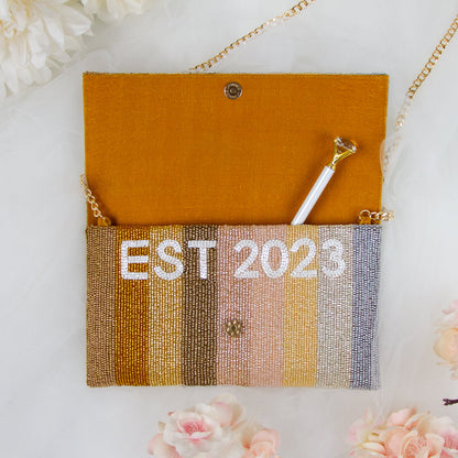 Handmade Custom Mrs Last Name Bridal Clutch (LHFC) with elegant beading, ideal for storing essentials on the wedding day