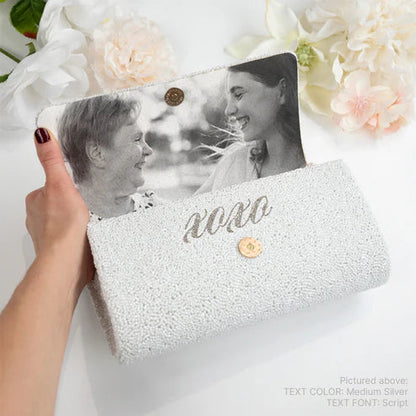 Elegant bridal clutch with an image of a mother and daughter on the inside