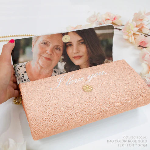 Elegant bridal clutch with an image of a mother and daughter on the inside