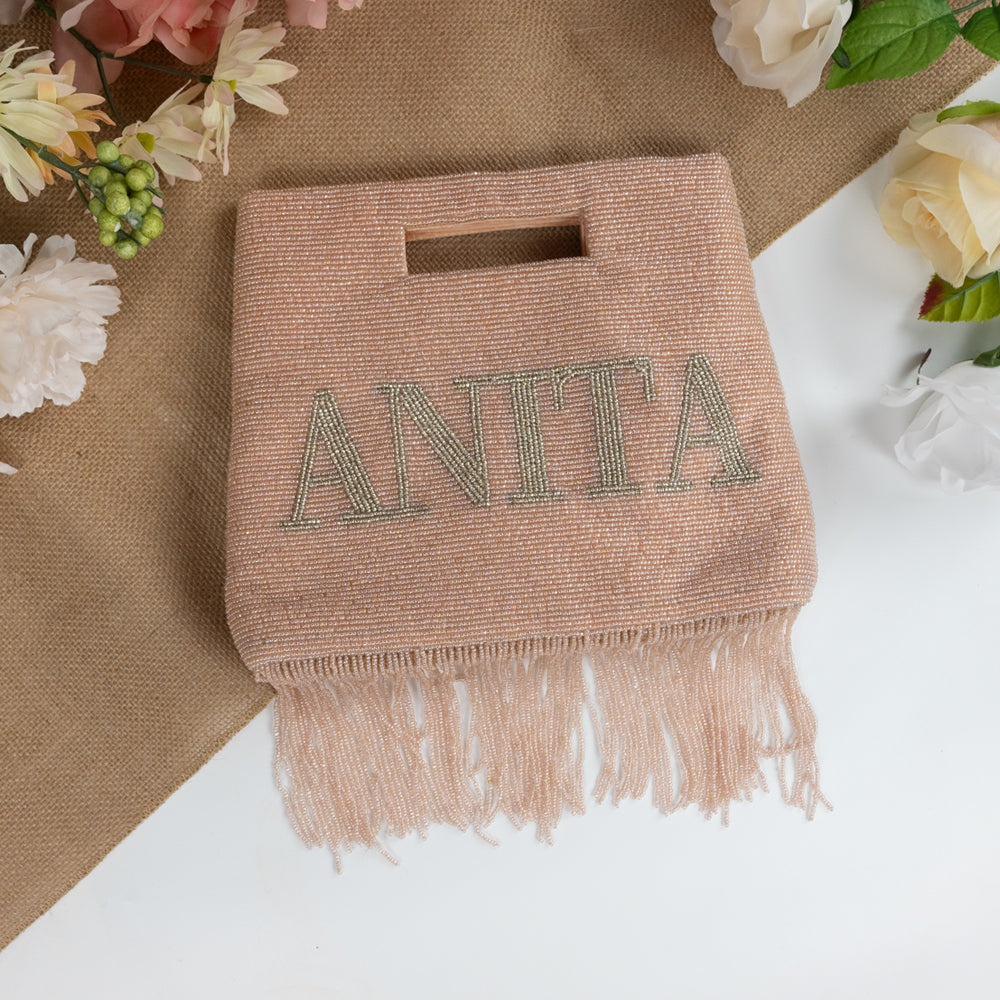 Handcrafted Custom Bridal Fringe Purse with intricate beading pattern, ideal for weddings, birthdays, and special occasions. Each unique clutch is a testament to artisanal craftsmanship, ensuring a one-of-a-kind accessory