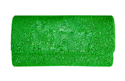 a roll of green glitter on a white background