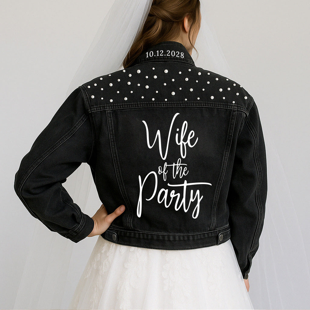 a woman in a wedding dress and a jacket that says wife of the party