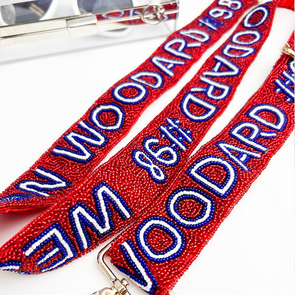 a pair of red and blue beaded lanyards