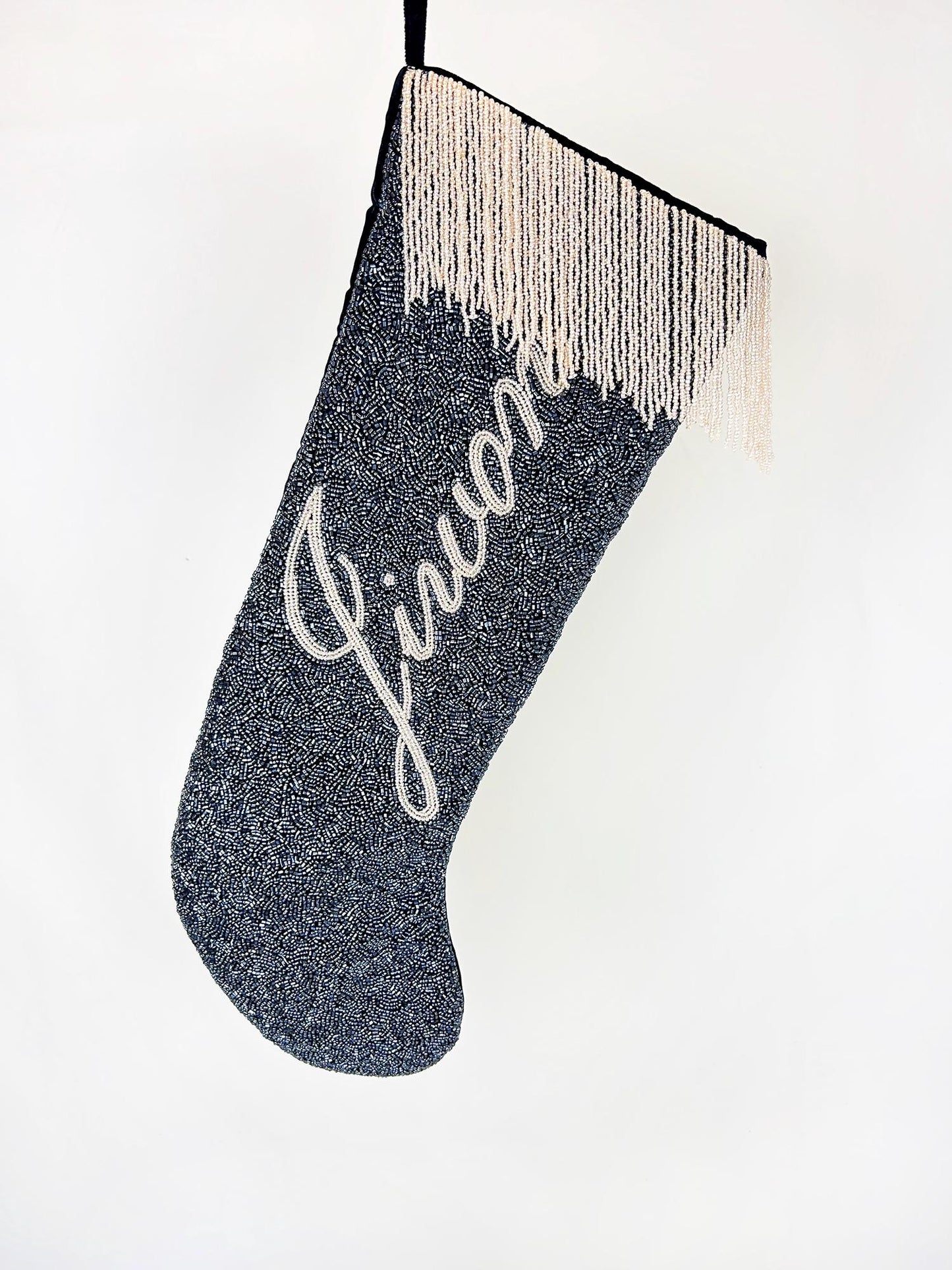 a christmas stocking with the word joy written on it