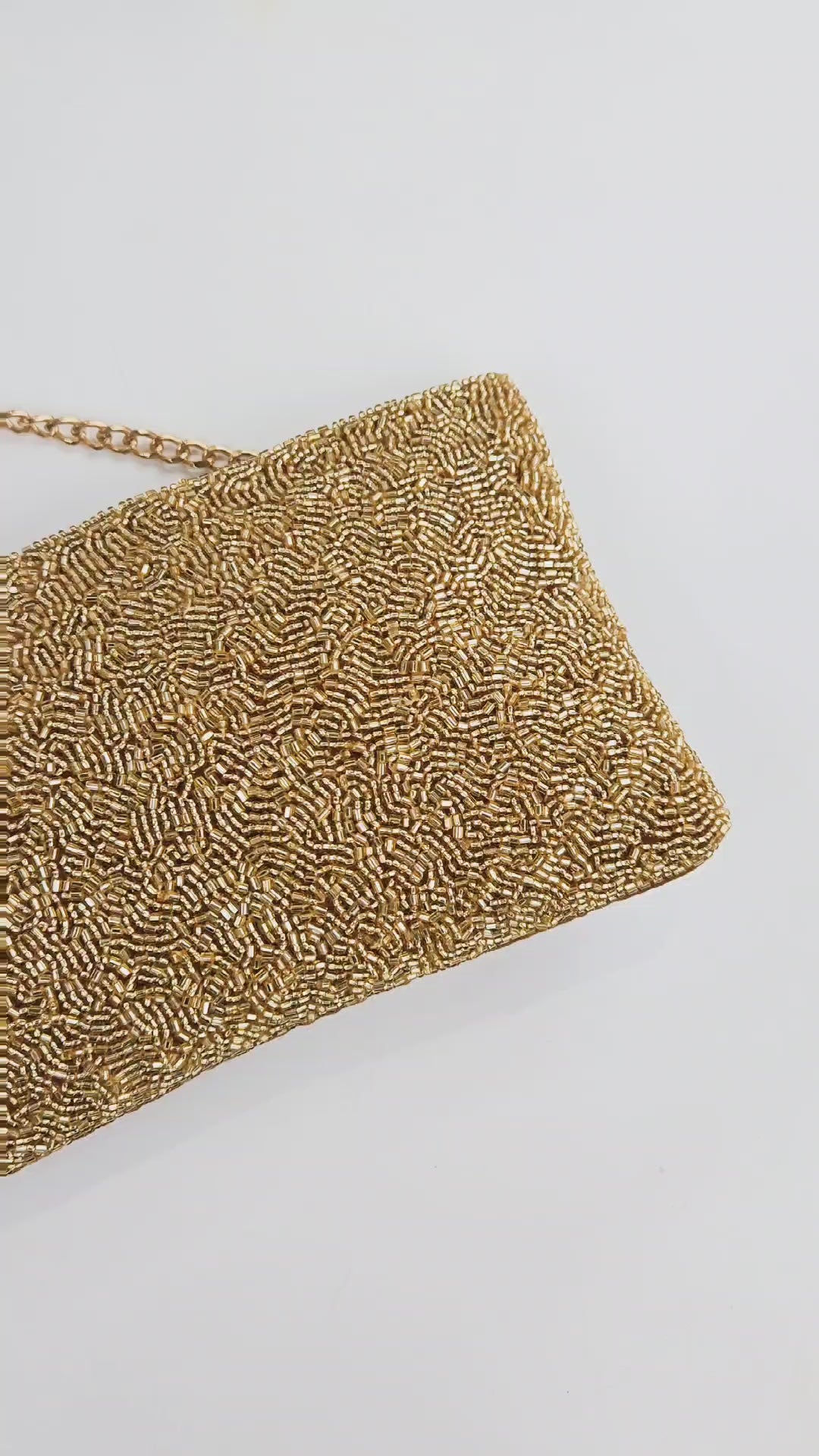Sophisticated Evening Bag for Wedding: A formal handbag designed for weddings and black-tie affairs, this seed bead clutch is a must-have accessory for an elegant look. Shine bright at any event with this sparkling evening bag.