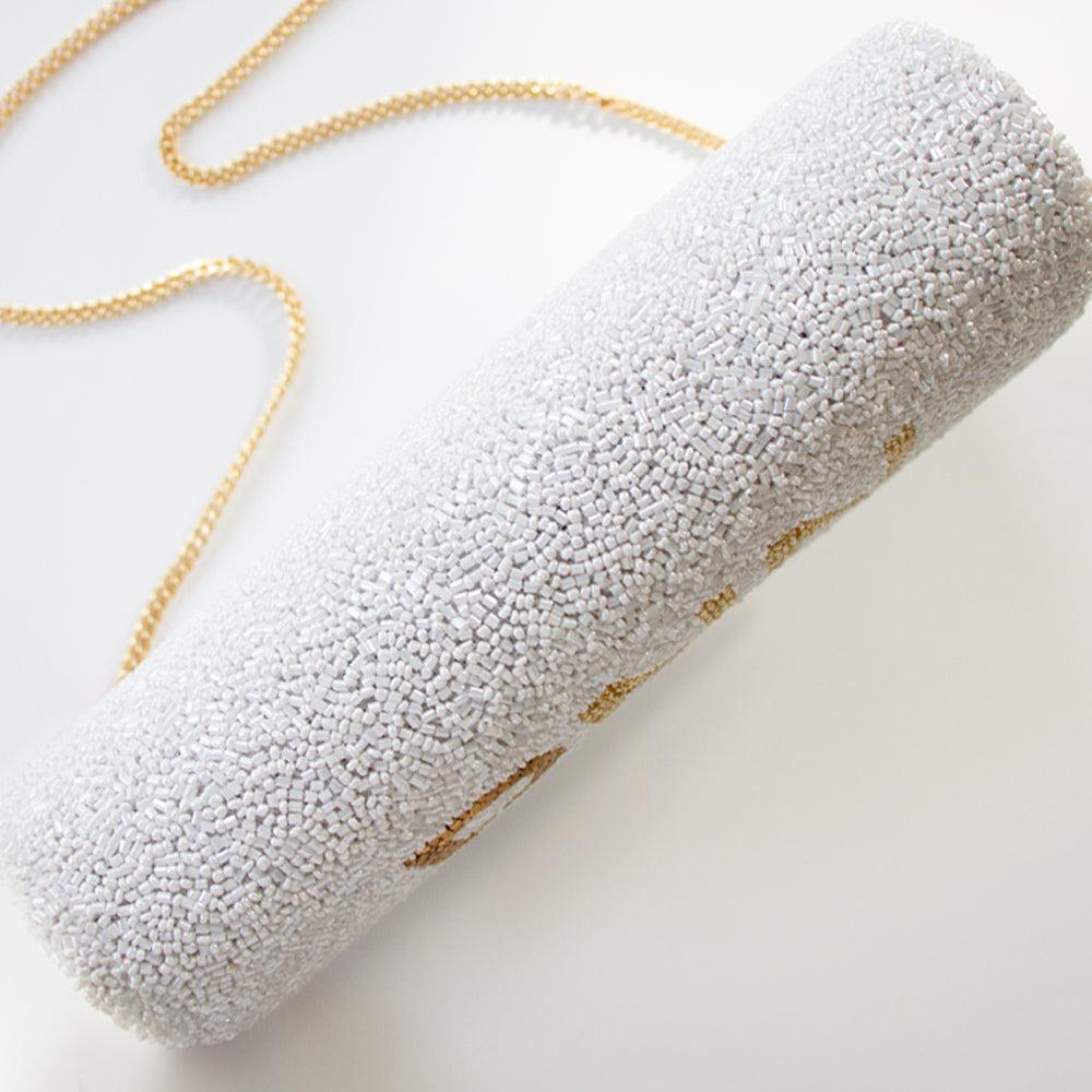Handcrafted Custom Mrs (Last Name) Bridal Clutch, adorned with intricate beading and available with a gold or silver chain. Measuring 9.5in x 5in x 3in, this unique bridal clutch is perfect for holding wedding day essentials and offers an option for an interior custom date. Each clutch is a testament to the beauty and individuality of handmade items