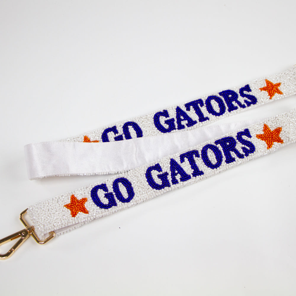 Customizable Game Day Beaded Purse Strap in various colors, suitable for crossbody bags, cameras, and guitars. Unique handmade design, ideal for personalized bridal gifts and game day accessories
